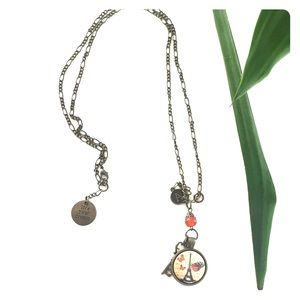 Long chain necklace with charms